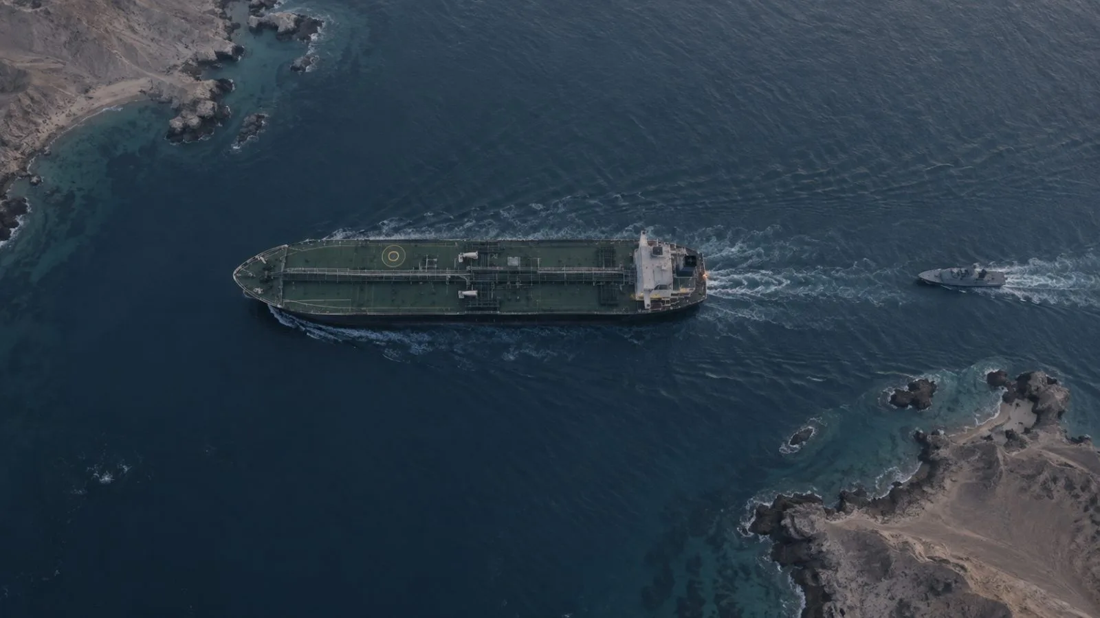 Oil tanker passing through the strait beside a naval escort / TokenPost.ai