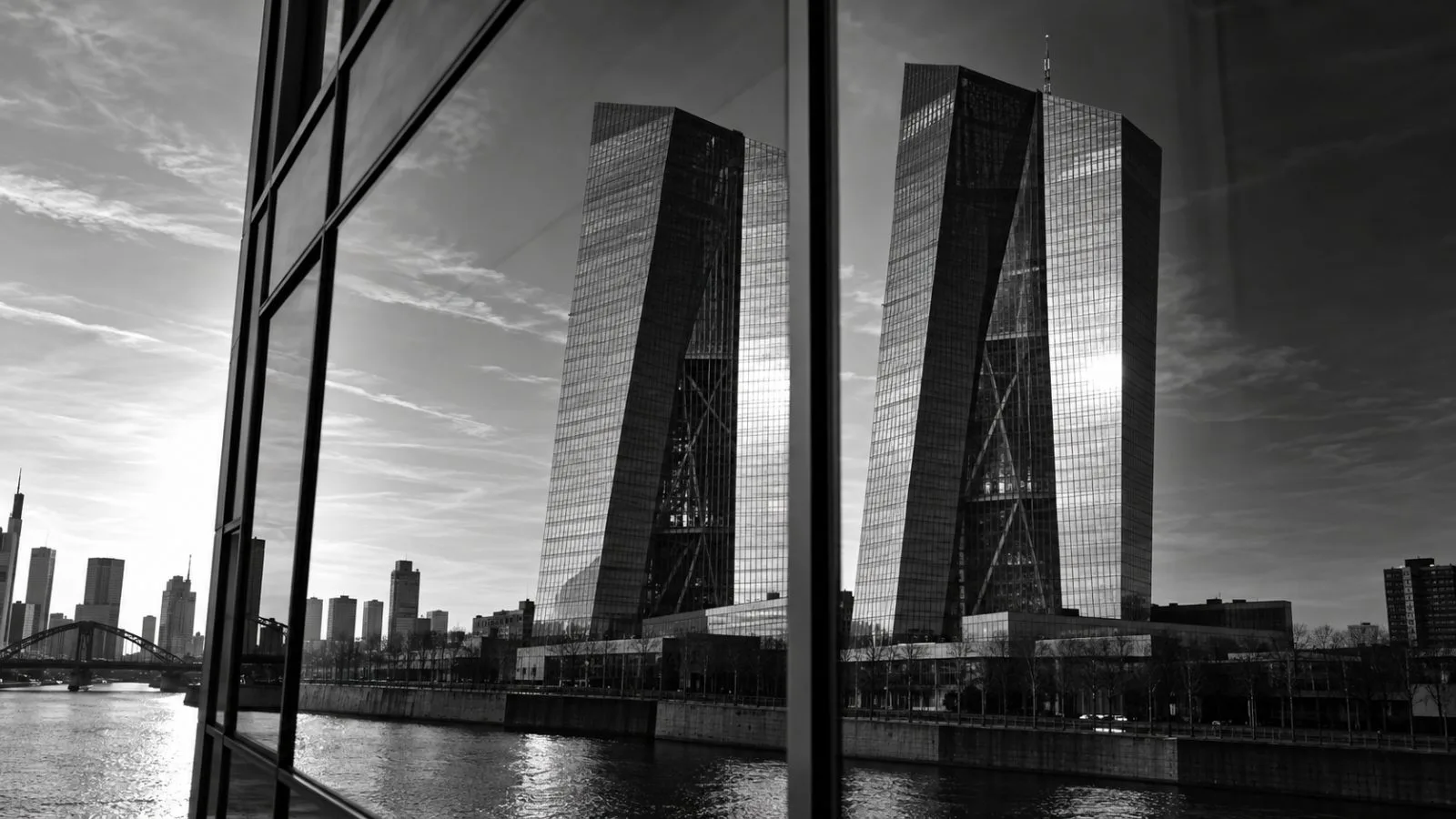 The ECB tower appears split across two glass panes. / TokenPost.ai