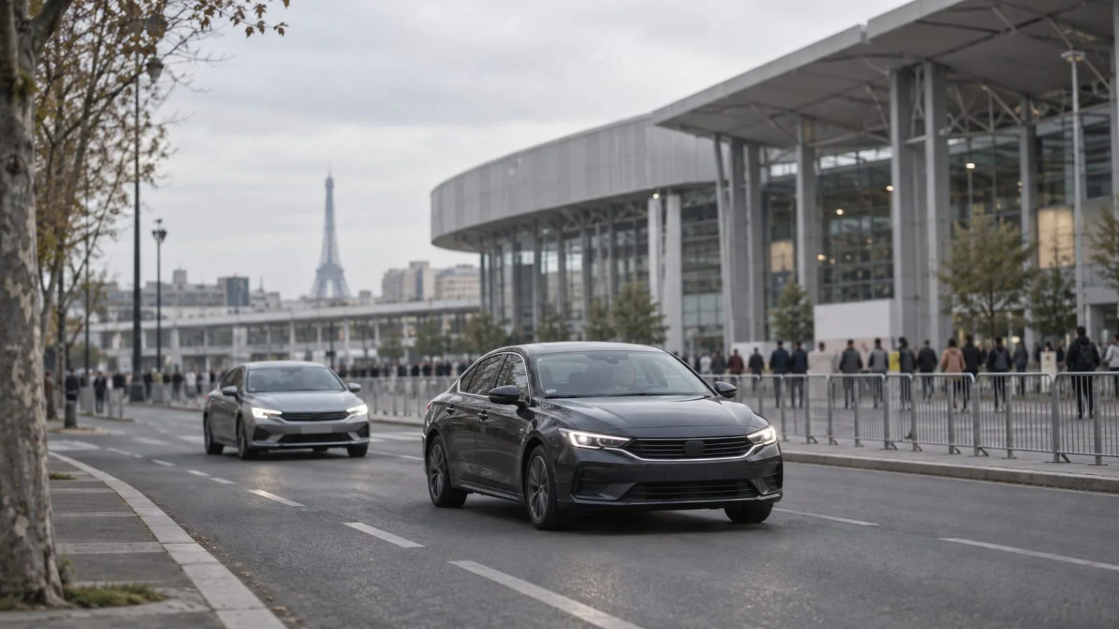 Two sedans navigate an open-road demonstration route outside Paris Expo / TokenPost.ai