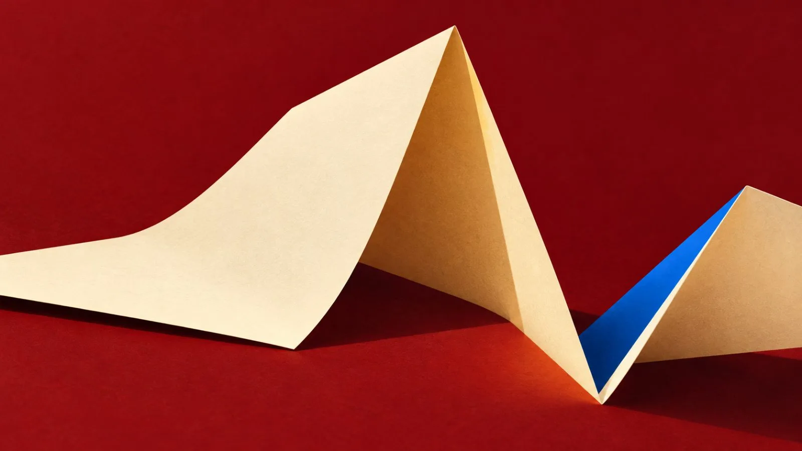 A folded earnings statement forms a rising ridge beside a deep crease / TokenPost.ai